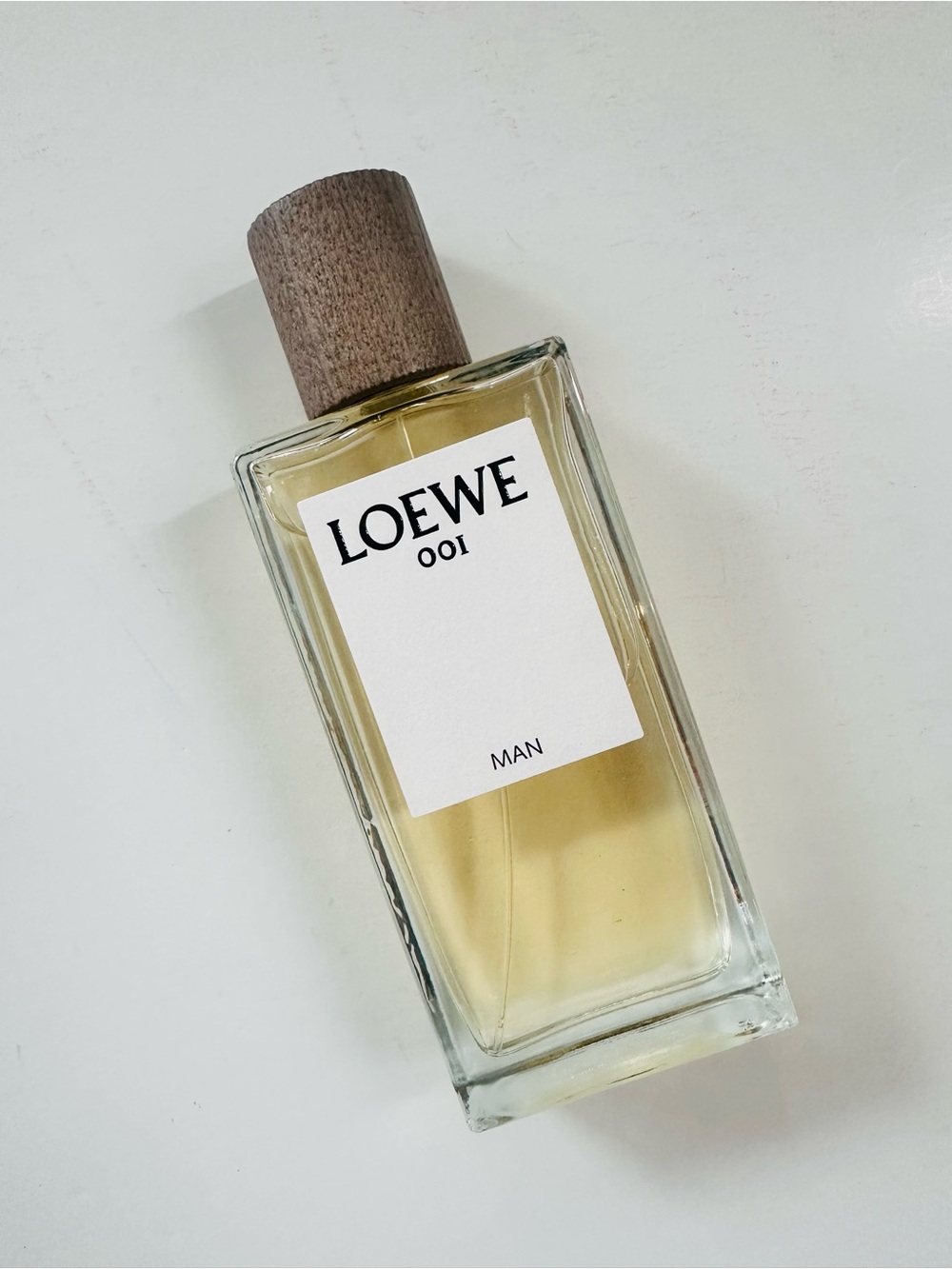 Loewe 001 Man Bottle in Light Amber and Wood Cap